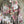 Load image into Gallery viewer, Tie-dye floral kimono duster in pink and olive with gold rose print, styled with colorful disc necklace - 7
