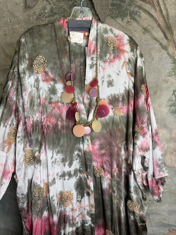 Tie-dye floral kimono duster in pink and olive with gold rose print, styled with colorful disc necklace - 7