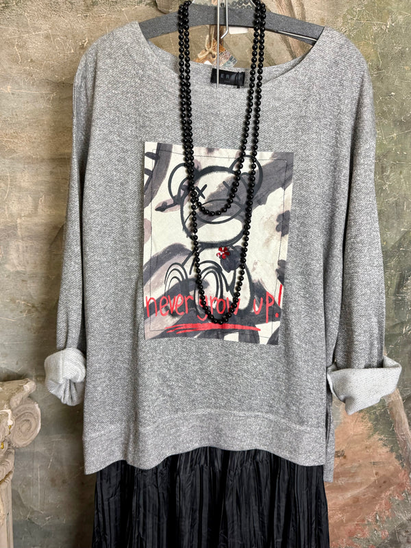 Gray heather Never Grow Up graphic sweatshirt top styled with black crinkle maxi skirt and beaded necklace - 3