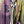 Load image into Gallery viewer, Sequin R&amp;L patch bomber jacket in purple and yellow-green ombre with floral accents, styled with tiered maxi skirt - 14
