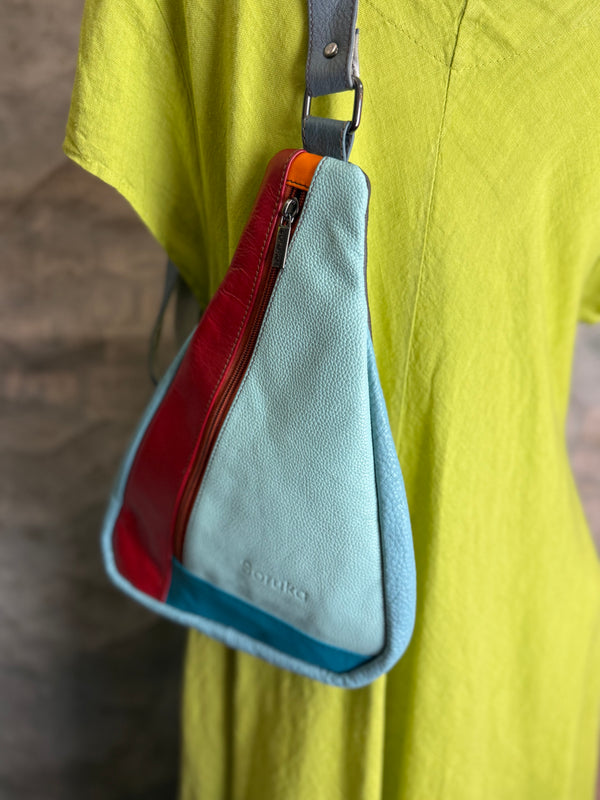 Soruka multicolor leather sling crossbody bag in light blue, red, and teal with orange zipper detail - 3