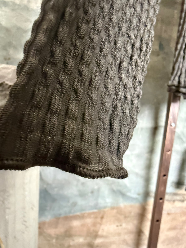 Olive green waffle knit turtleneck long sleeve fitted top displayed with chunky beaded statement necklace on hanger - 5