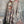 Load image into Gallery viewer, Boho waffle knit tunic top with abstract art print in earthy tones, styled with colorful chain necklace on mannequin - 3
