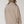 Load image into Gallery viewer, Woman wearing oversized taupe quarter-zip pullover sweatshirt with exposed seams and ribbed cuffs - 3
