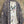 Load image into Gallery viewer, Blue white shibori ikat print kimono jacket open front boho style layered over floral tee with flower necklace - 3
