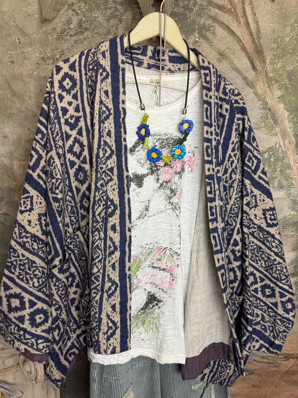 Blue white shibori ikat print kimono jacket open front boho style layered over floral tee with flower necklace - 3