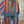 Load image into Gallery viewer, Boho serape striped duster cardigan with denim pockets, styled with red bead necklace and belt on mannequin - 4
