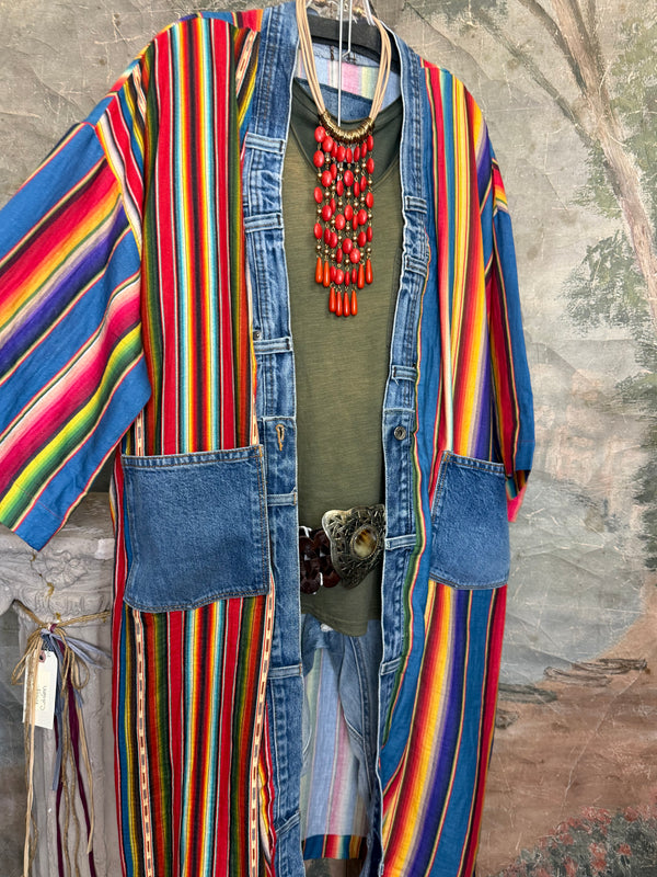 Boho serape striped duster cardigan with denim pockets, styled with red bead necklace and belt on mannequin - 4
