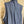 Load image into Gallery viewer, Long denim zip-front sleeveless vest with drawstring hem displayed on mannequin, boutique Merritt style - 12
