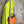 Load image into Gallery viewer, Soruka orange multicolor leather crossbody bag with gray strap on lime green linen dress mannequin - 1
