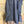 Load image into Gallery viewer, Long denim zip-front sleeveless vest with drawstring hem displayed on mannequin, boutique Merritt style - 9

