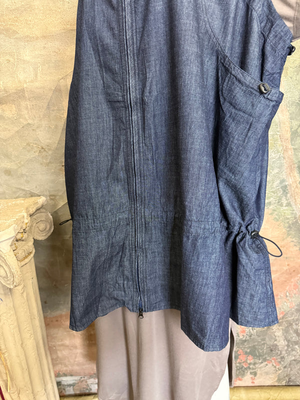 Long denim zip-front sleeveless vest with drawstring hem displayed on mannequin, boutique Merritt style - 9