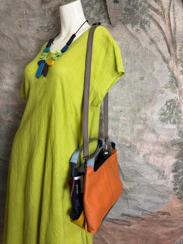 Soruka orange multicolor leather crossbody bag with gray strap on lime green linen dress mannequin - 5