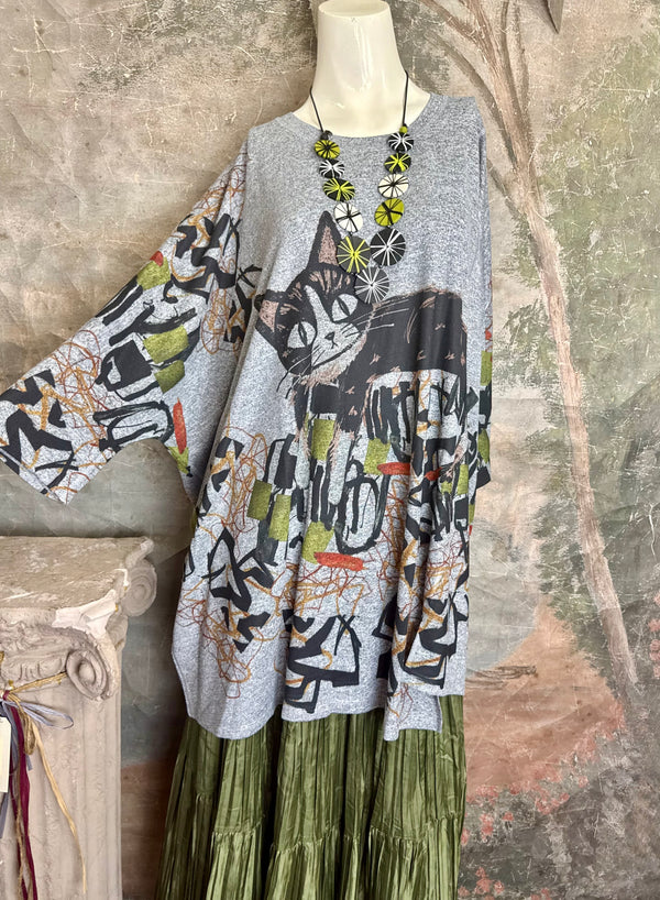 Oversized gray cat print crew pullover tunic with abstract art design on mannequin, styled with olive skirt and neon nec - 7