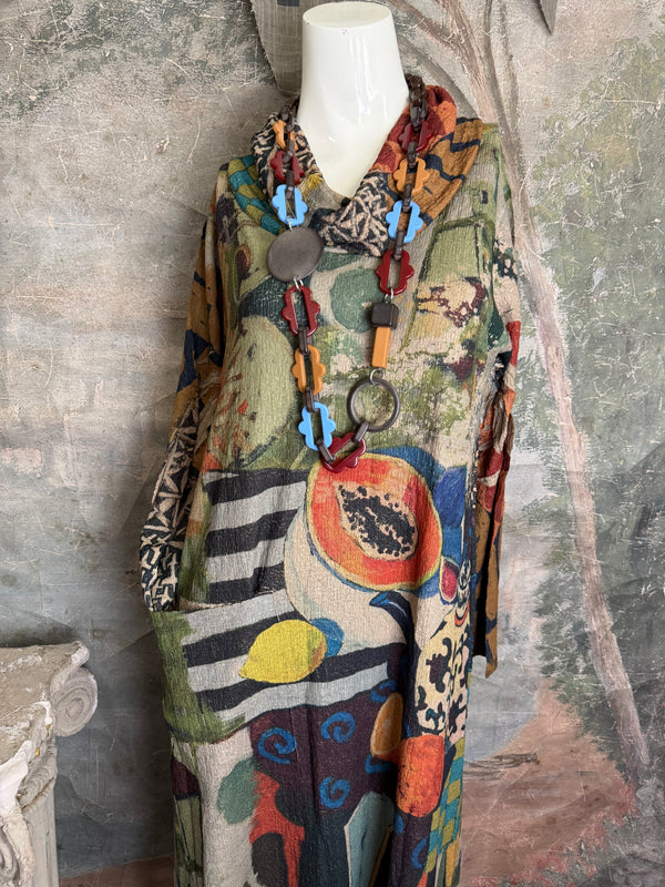 D541 waffle knit cowlneck dress featuring vibrant abstract fruit and geometric mixed print, draped on mannequin - 8