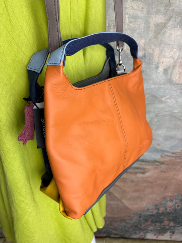 Soruka orange multicolor leather crossbody bag with gray strap on lime green linen dress mannequin - 3