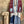 Load image into Gallery viewer, Burgundy bandana print short kimono with denim pocket accents, layered over white top and blue denim skirt with bead nec - 1

