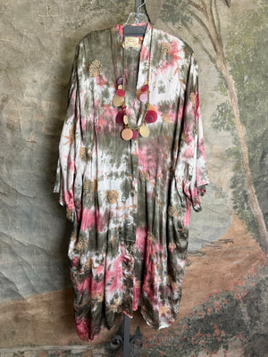 Tie-dye floral kimono duster in pink and olive with gold rose print, styled with colorful disc necklace - 1