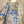 Load image into Gallery viewer, Gray oversized crew pullover sweater with colorful Nona's Kitchen interior scene print and abstract brushstroke details - 1
