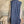 Load image into Gallery viewer, Long denim zip-front sleeveless vest with drawstring hem displayed on mannequin, boutique Merritt style - 10
