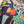 Load image into Gallery viewer, D541 waffle knit cowlneck dress featuring vibrant abstract fruit and geometric mixed print, draped on mannequin - 33
