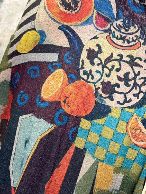 D541 waffle knit cowlneck dress featuring vibrant abstract fruit and geometric mixed print, draped on mannequin - 33