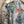 Load image into Gallery viewer, T1597 Waffle Knit Pullover with graffiti print over olive green crinkle tiered skirt on mannequin - 5
