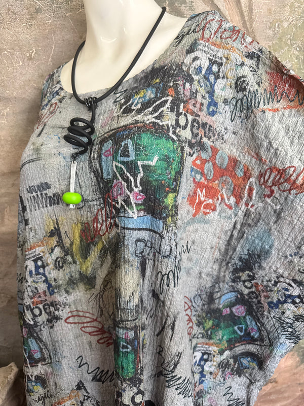 T1597 Waffle Knit Pullover with graffiti print over olive green crinkle tiered skirt on mannequin - 5