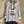 Load image into Gallery viewer, Gray heather Never Grow Up graphic sweatshirt top styled with black crinkle maxi skirt and beaded necklace - 5
