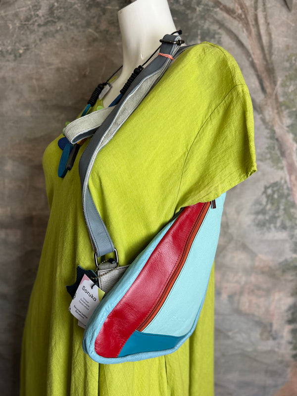 Soruka multicolor leather sling crossbody bag in light blue, red, and teal with orange zipper detail - 5
