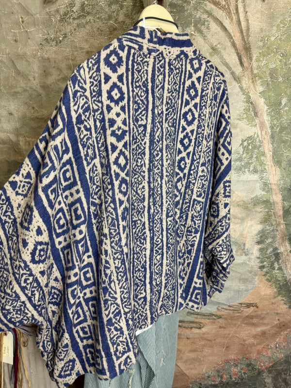 Blue white shibori ikat print kimono jacket open front boho style layered over floral tee with flower necklace - 9