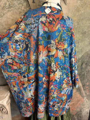 Oversized blue floral print crew pullover with orange and multicolor botanical pattern, long sleeves, relaxed fit - 10