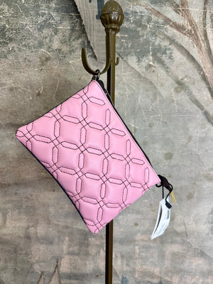 Pink leather quilted crossbody bag with geometric stitching pattern and black adjustable strap on lime green dress - 2