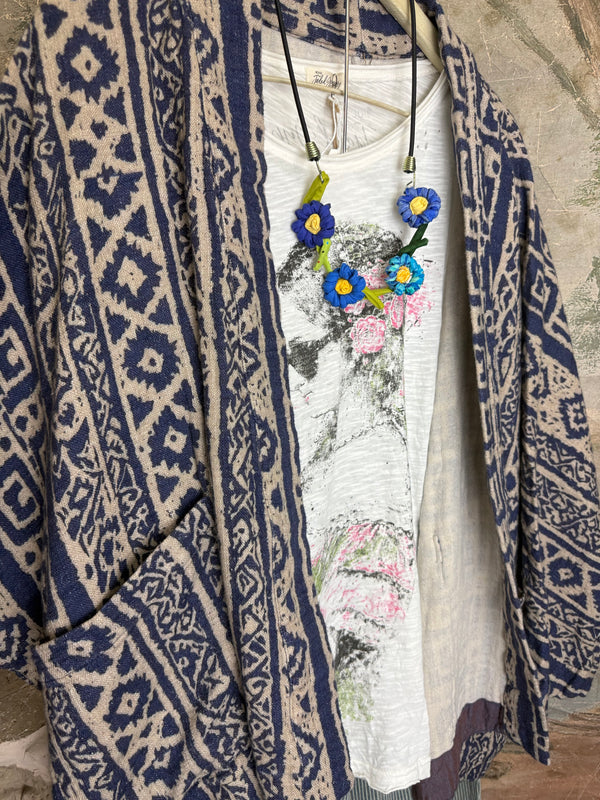 Blue white shibori ikat print kimono jacket open front boho style layered over floral tee with flower necklace - 4