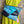 Load image into Gallery viewer, Mila color-block crossbody bag in teal, blue, and navy leather with turquoise strap, styled on mannequin with lime dress - 8
