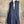Load image into Gallery viewer, Long denim zip-front sleeveless vest with drawstring hem displayed on mannequin, boutique Merritt style - 1
