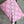 Load image into Gallery viewer, Pink leather quilted crossbody bag with geometric stitching pattern and black adjustable strap on lime green dress - 6
