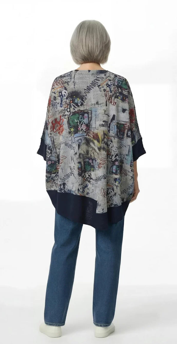 T1597 Waffle Knit Pullover with graffiti print over olive green crinkle tiered skirt on mannequin - 3