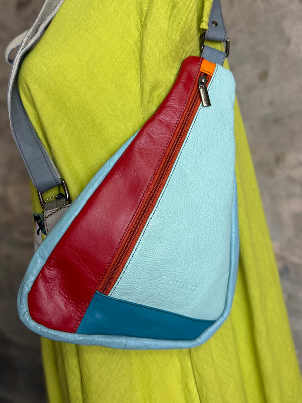 Soruka multicolor leather sling crossbody bag in light blue, red, and teal with orange zipper detail - 6