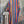 Load image into Gallery viewer, Boho serape striped duster cardigan with denim pockets, styled with red bead necklace and belt on mannequin - 17
