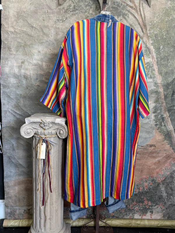 Boho serape striped duster cardigan with denim pockets, styled with red bead necklace and belt on mannequin - 17