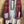Load image into Gallery viewer, Burgundy bandana print short kimono with denim pocket accents, layered over white top and blue denim skirt with bead nec - 4
