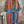 Load image into Gallery viewer, Boho serape striped duster cardigan with denim pockets, styled with red bead necklace and belt on mannequin - 2
