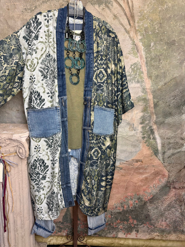 Boho patchwork denim cardigan with floral and aztec prints, large patch pockets, open front, styled with green necklace - 5