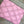 Load image into Gallery viewer, Pink leather quilted crossbody bag with geometric stitching pattern and black adjustable strap on lime green dress - 8

