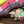 Load image into Gallery viewer, Alma shoulder bag in red pebbled leather with gray handles and teal accents on lime green dress mannequin - 5

