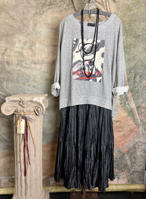 Gray heather Never Grow Up graphic sweatshirt top styled with black crinkle maxi skirt and beaded necklace - 1