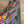 Load image into Gallery viewer, Fiesta denim boyfriend shirt with vibrant multicolor floral embroidery on chambray blue, displayed on hanger with pink l - 7
