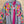 Load image into Gallery viewer, Fiesta denim boyfriend shirt with vibrant multicolor floral embroidery on chambray blue, displayed on hanger with pink l - 1
