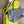 Load image into Gallery viewer, Gray leather shoulder bag with drawstring closure displayed on mannequin wearing lime green dress and colorful beaded ne - 2
